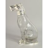 A SILVER PLATED DOG CLARET JUG. 9.5ins high.