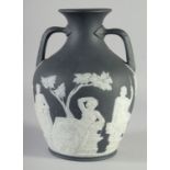 A GOOD BLACK AND WHITE JASPER WARE PORTLAND VASE. Circa. 1780. 10.5ins high, the base with the