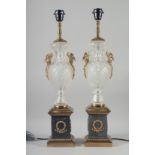 A PAIR OF GLASS AND ORMOLU URN SHAPED PEDESTAL TABLE LAMPS with swan handles. 2ft 1in high.
