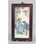 A CHINESE FRAMED PORCELAIN PLAQUE. 9.5ins x 4.5ins.