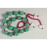 A VERY GOOD JADE BEAD NECKLACE. 18 x 2cm jade beads. 50cm long.