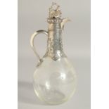 A GOOD VICTORIAN GLASS AND SILVER CLARET JUG by GEORGE FOX with fruiting vine stopper. London 1855.