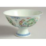 A CHINESE MING STYLE DOUCAI PORCELAIN DRAGON STEM BOWL, the interior of the base with an extended