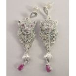 A PAIR OF SILVER, RUBY, MARCASITE PANTHER EARRINGS.