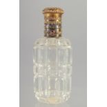 A GOOD CUT GLASS SCENT BOTTLE with gold top. 3.5ins long.