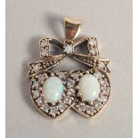 A 9CT GOLD, OPAL AND DIAMOND SWEETHEART PENDANT.