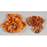 FOUR VARIOUS STINGS OF AMBER BEADS. 110gms.