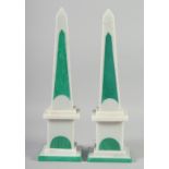 A PAIR OF MALACHITE OBELISKS on square bases. 17ins high.