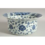 A CHINESE BLUE AND WHITE PORCELAIN WASH BOWL, with floral decoration and wave pattern rim, 32cm