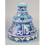 A VERY UNUSUAL LARGE 19TH CENTURY INDIAN MULTAN IZNIK STYLE GLAZED POTTERY CANDLESTICK, with a