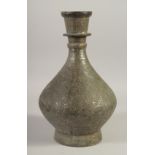 AN ISLAMIC TINNED COPPER VASE, 32cm high.