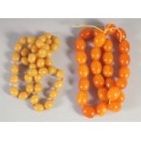 TWO BAKELITE / AMBER STYLE BEADED NECKLACES.
