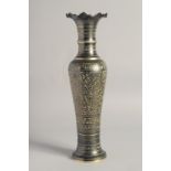 A FINE INDIAN METAL VASE, with engraved decoration, 40.5cm high.