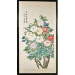 A LARGE CHINESE PAINTING OF FLOWERS, inscribed and with red seal mark, framed and glazed, image