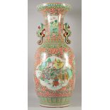 A VERY LARGE CHINESE POLYCHROME TWIN HANDLE VASE, with two large panels of warriors on horseback and