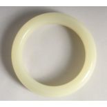 A CHINESE JADE BANGLE.