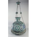 A 19TH CENTURY ISLAMIC ENAMELLED OPENWORK MOSQUE CHANDELIER, with hanging chains, 49cm diameter.