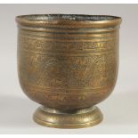 AN ISLAMIC ENGRAVED AND CHASED BRASS JARDINIERE, decorated with animals and foliage, 20cm high.