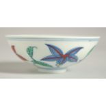 A CHINESE MING STYLE DOUCAI CUP, 9cm diameter.