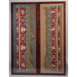 A PAIR OF 19TH CENTURY CHINESE EMBROIDERED SILK PANELS, with characters and flora, framed and