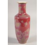 A CHINESE RED GLAZE PORCELAIN VASE, with gilt decoration, the base with six-character mark, 22.5cm