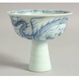 A CHINESE BLUE AND WHITE PORCELAIN STEM CUP, the exterior with dragon, cup 9.5cm diameter.