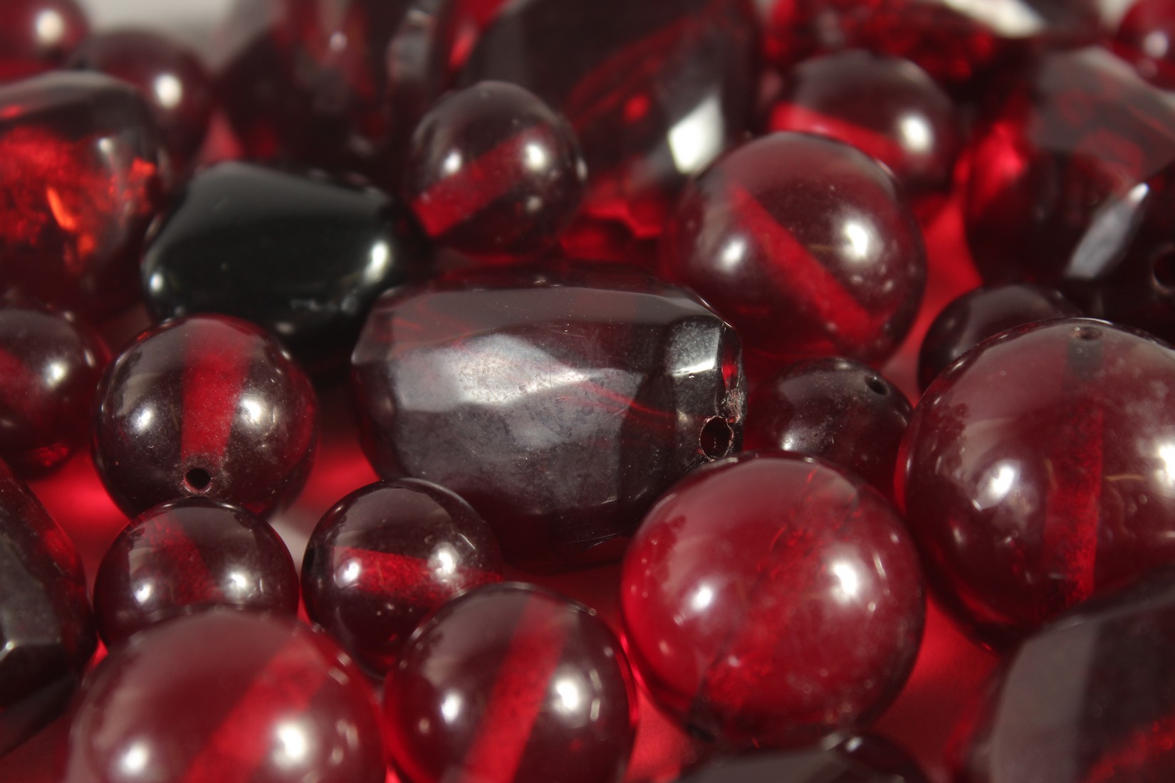 A COLLECTION OF RUBY-COLOUR BEADS, various sizes, (qty). - Image 2 of 2