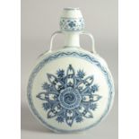 A CHINESE BLUE AND WHITE PORCELAIN TWIN HANDLE MOON FLASK, with central yin-yang medallion radiating