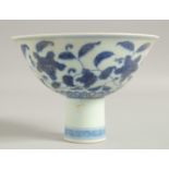 A CHINESE BLUE AND WHITE PORCELAIN STEM CUP, with floral decoration, bowl 15cm diameter.