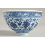 A CHINESE MING STYLE BLUE AND WHITE CUP, character mark to interior centre, 9cm diameter.