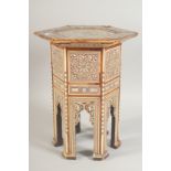 AN OTTOMAN MOTHER OF PEARL INLAID WOODEN STAND, (with faults), 31cm high.