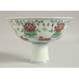 A CHINESE DOUCAI PORCELAIN PEDESTAL BOWL, decorated with ducks and floral motifs, bowl 15.5cm