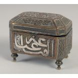 A SYRIAN MINIATURE BRASS BOX, with hinged lid, 7cm x 4.5cm.