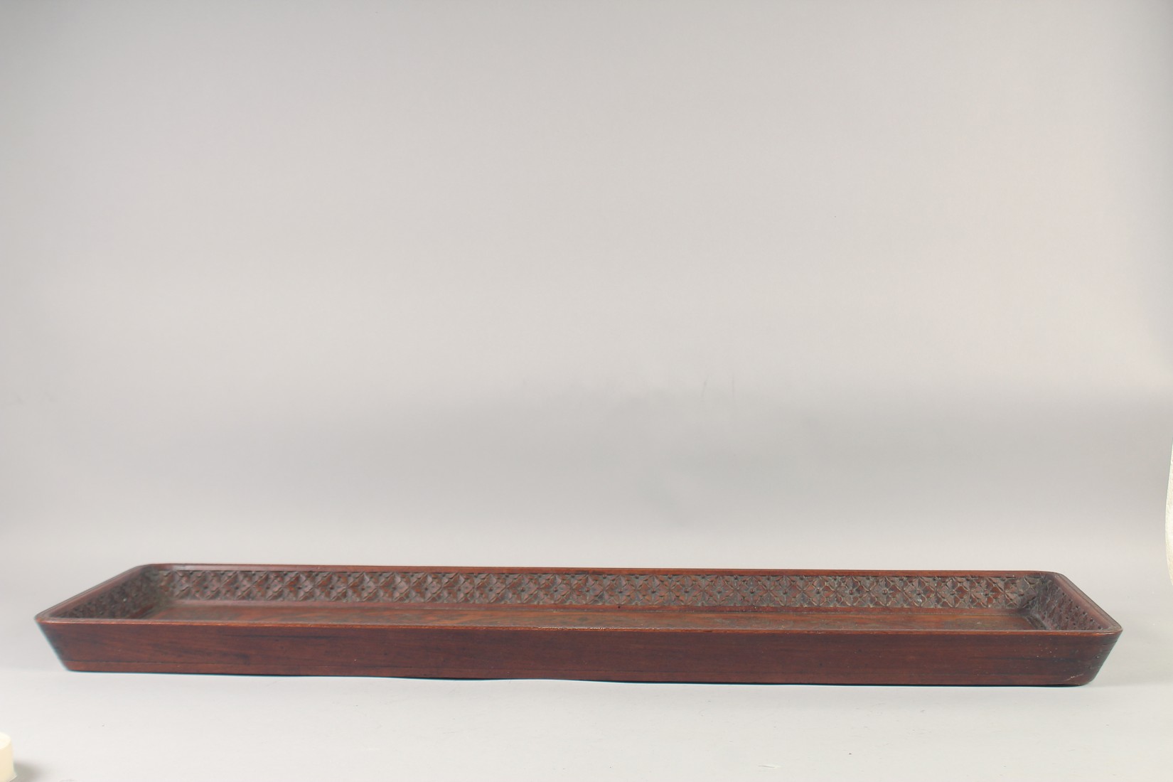 AN INDIAN BRASS INLAID CARVED HARDWOOD RECTANGULAR TRAY, 94.5cm x 30.5cm. - Image 2 of 3