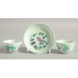 TWO CHINESE DOUCAI PORCELAIN CUPS AND A SAUCER, each similarly decorated with grapes, saucer 8cm