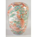 A LARGE JAPANESE KUTANI PORCELAIN VASE, painted with two large panels, one of a phoenix, the other