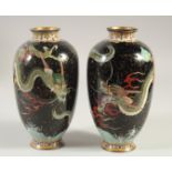 A PAIR OF CHINESE CLOISONNE DRAGON VASES, 18cm high.