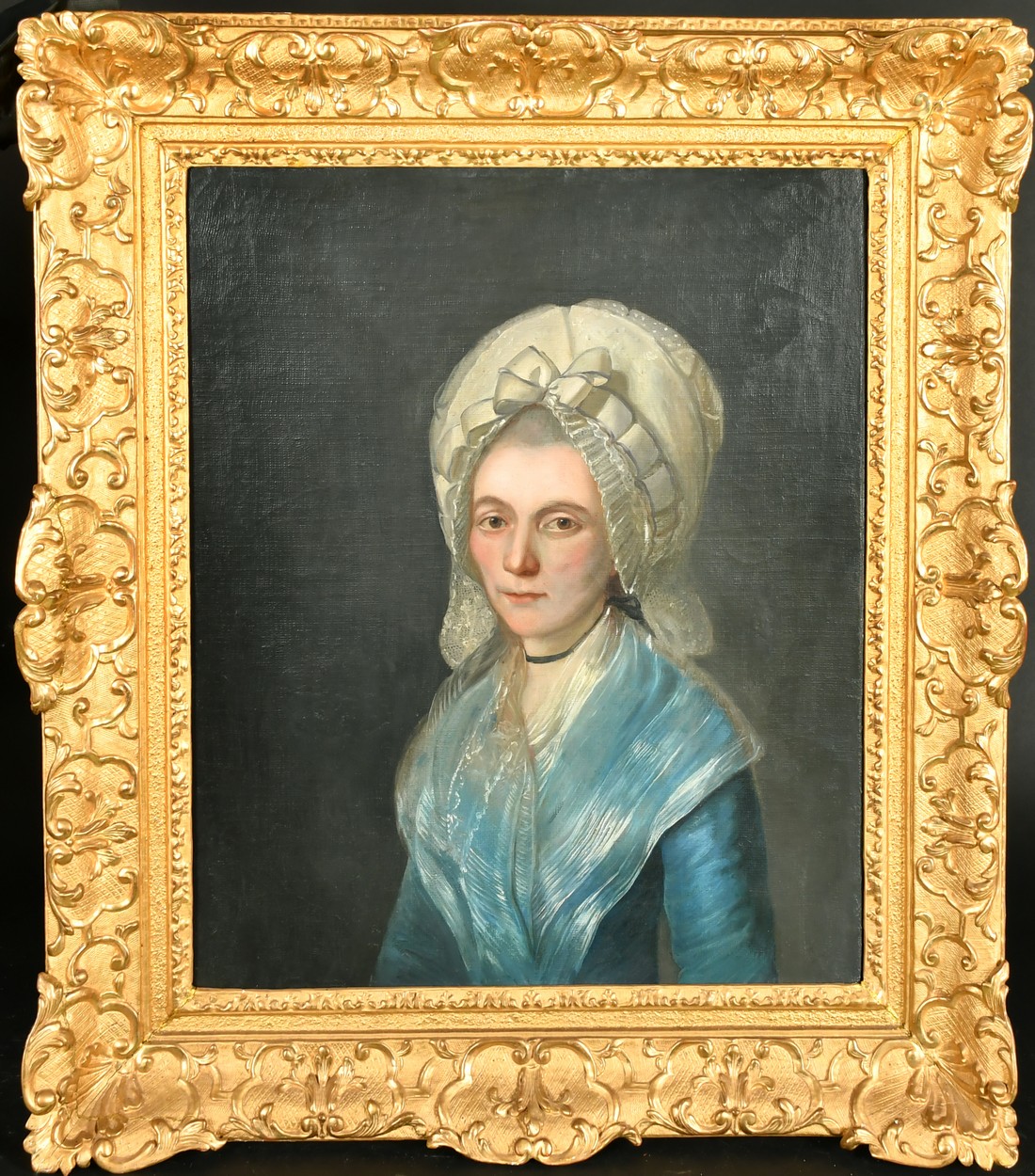 Mid-19th Century Continental School, a half length portrait of a lady in a white bonnet, oil on - Image 2 of 3