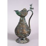 A 12TH CENTURY ISLAMIC PERSIAN BRONZE JUG, 15cm high.