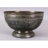 AN ISLAMIC PERSIAN SAFAVID OR LATER BRONZE BOWL, with carved hunting scenes, and flora, 12cm high