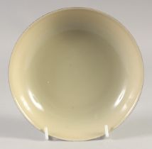 A CHINESE YELLOW GLAZE PORCELAIN DISH, six-character mark to base, 17.5cm diameter.