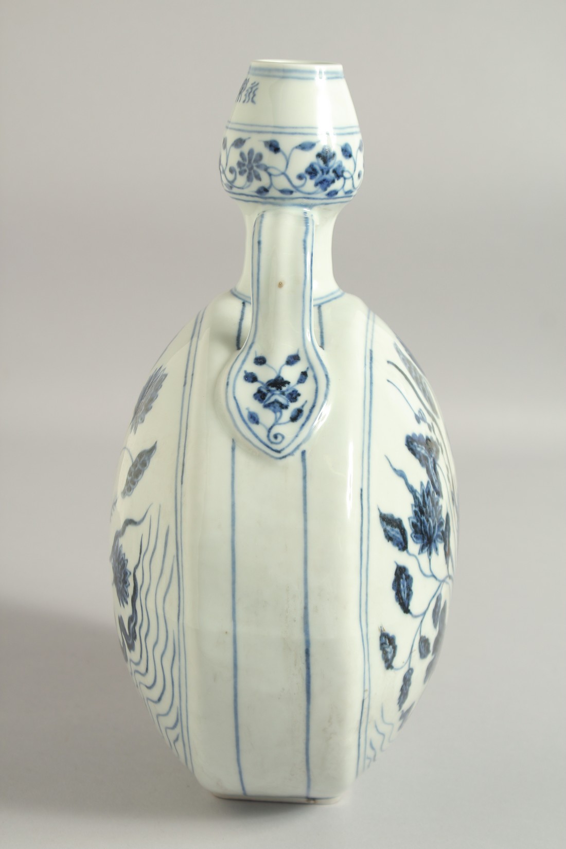 A CHINESE BLUE AND WHITE TWIN HANDLE MOON FLASK, with central floral spray, 30cm high. - Image 6 of 9