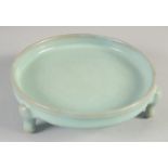 A CHINESE RU WARE STYLE TRIPOD DISH, 14cm diameter.