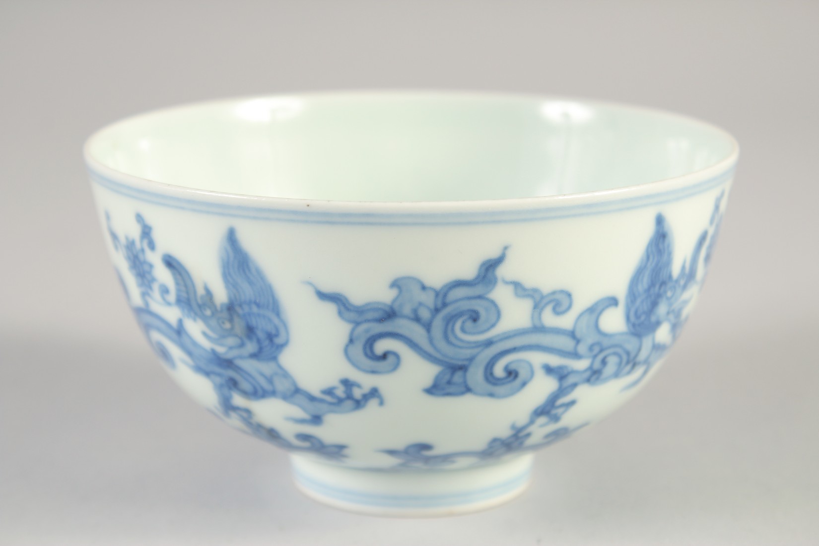 A CHINESE BLUE AND WHITE PORCELAIN BOWL, decorated with Kui dragons, six-character mark to base, - Image 3 of 6