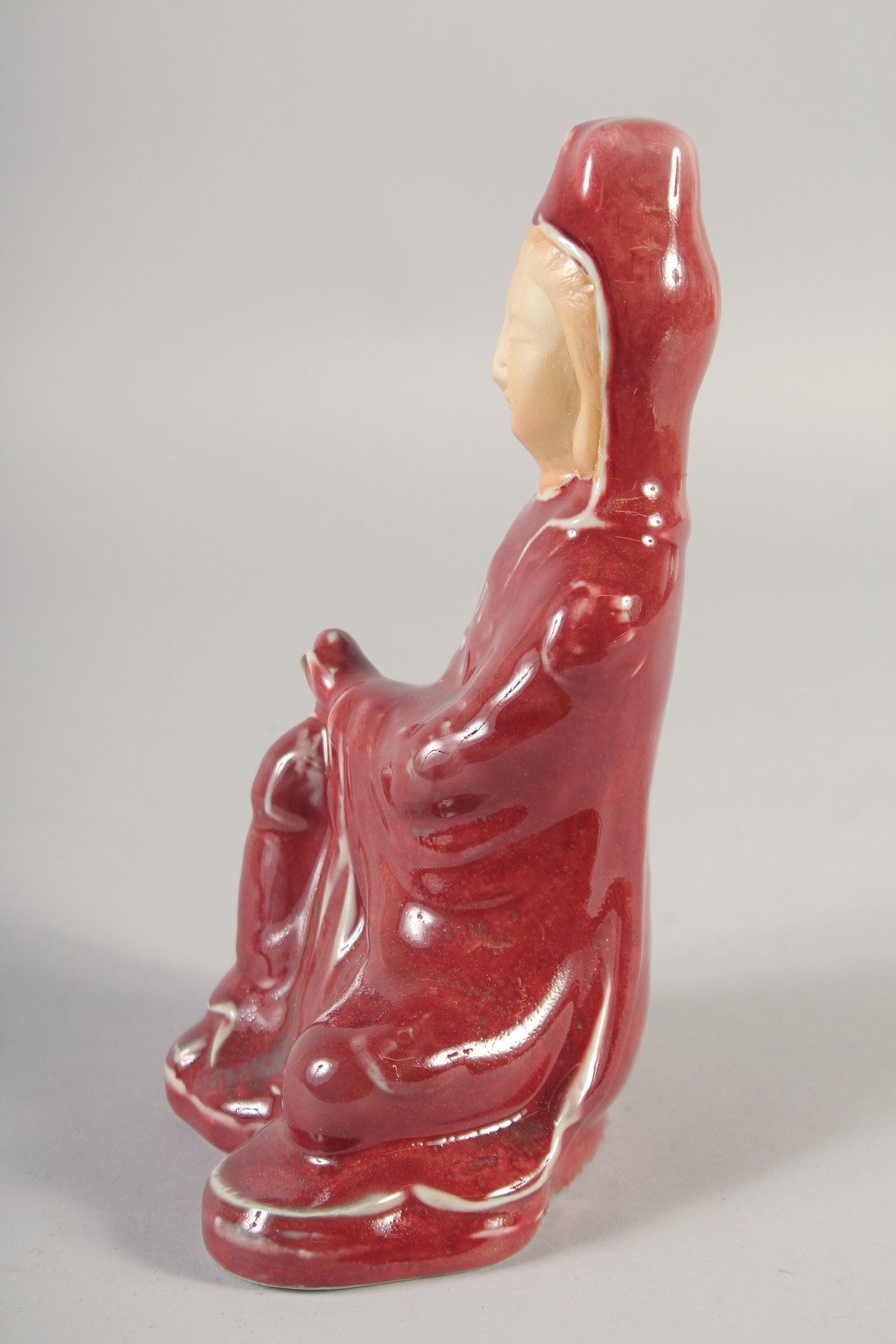 A CHINESE COPPER RED GLAZE PORCELAIN FIGURE, 21cm high. - Image 4 of 6