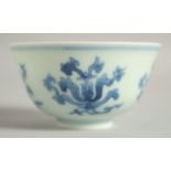 A CHINESE BLUE AND WHITE PORCELAIN CUP, six-character mark to base, 7.5cm diameter.