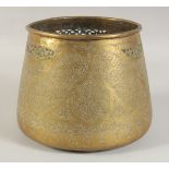 AN ISLAMIC ENGRAVED AND CHASED CALLIGRAPHIC BOWL, 23cm diameter.