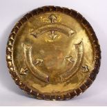 A 19TH CENTURY ISLAMIC TURKISH BRASS MOULDED CALLIGRAPHIC DISH, with moulded bands of calligraphy