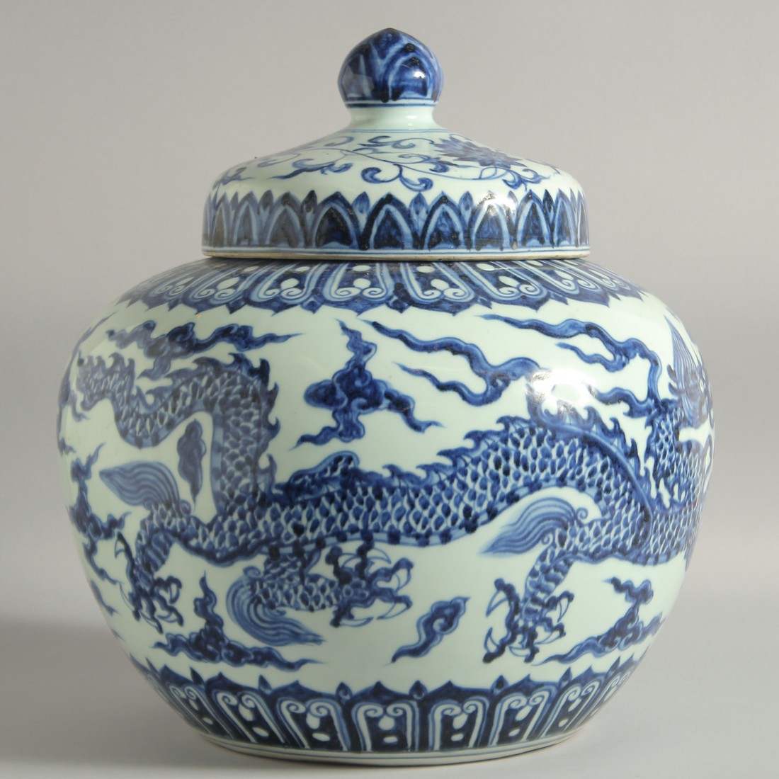 A LARGE CHINESE BLUE AND WHITE PORCELAIN JAR AND COVER, decorated with a dragon and stylised clouds, - Image 2 of 9