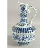 A CHINESE BLUE AND WHITE PORCELAIN EWER, with flora and phoenix, incised character mark to base,